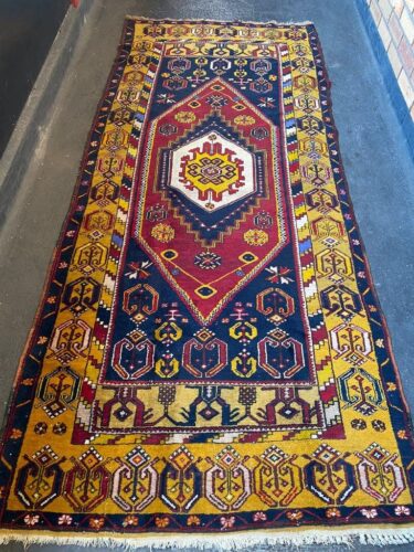 Vintage handmade wool rug 250cm x113cm.