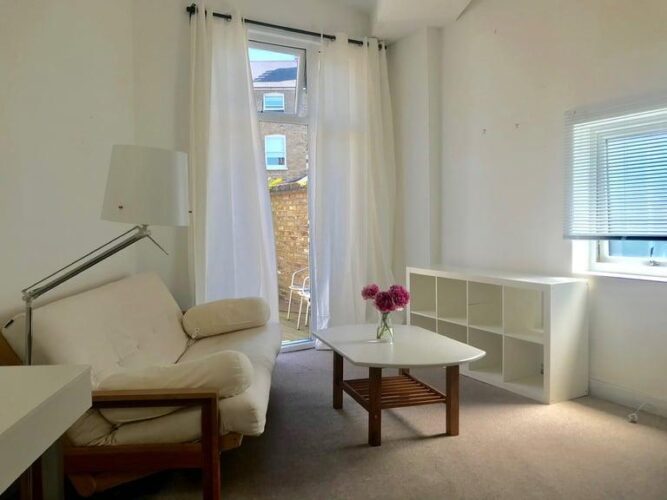 light sunny studio flat in converted warehouse